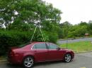 This is WB2AMU QRP portable setup.   Rain intrusion on Saturday presented a problem for the open sunroof used for the antenna feedlines!